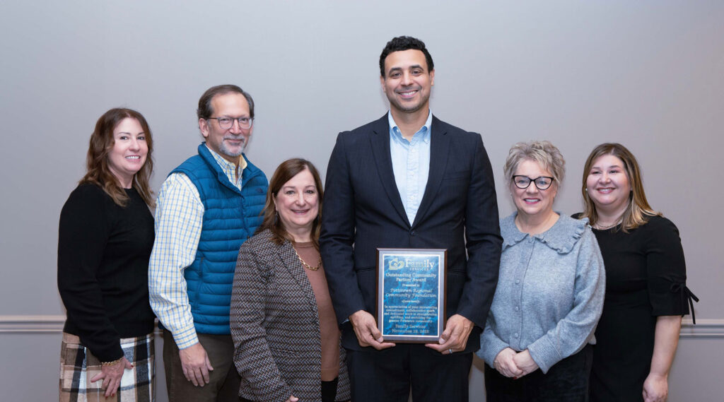 Members of The Pottstown Regional Community Foundation hold their Outstanding Community Partner Award.