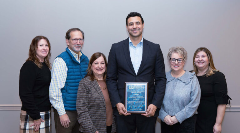 Members of The Pottstown Regional Community Foundation hold their Outstanding Community Partner Award.